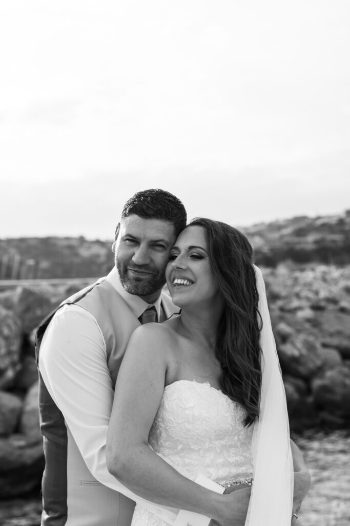 Outdoors island wedding ceremony, editorial photography, destination wedding at Agios Stephanos, Kastri island in KOS, Greece. Bride and groom couple photos by the pier.
