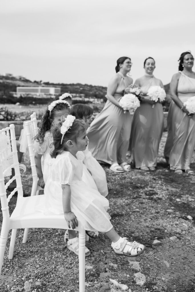 Outdoors island wedding ceremony, editorial photography, destination wedding at Agios Stephanos, Kastri island in KOS, Greece.