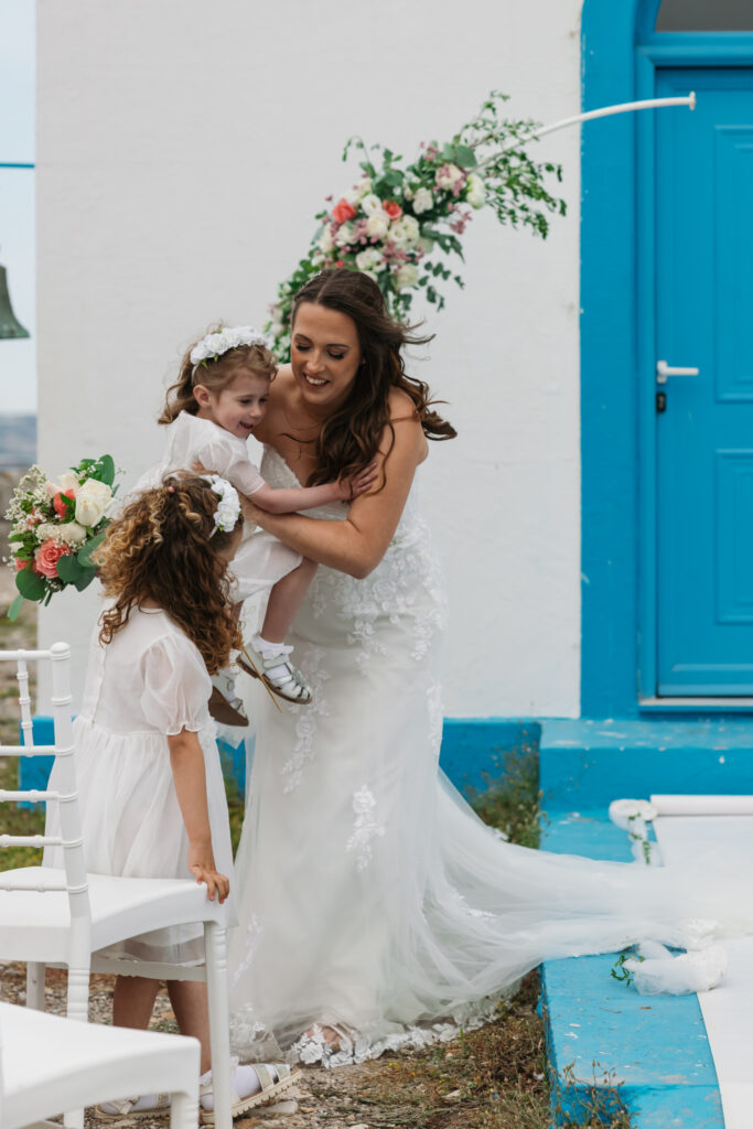Outdoors island wedding ceremony, editorial photography, destination wedding at Agios Stephanos, Kastri island in KOS, Greece.