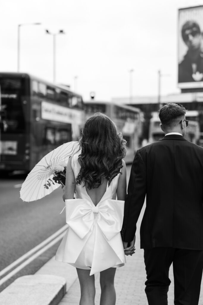 Intimate Liverpool elopement with Gen Z couple – city chic civil wedding at St George's Hall with editorial fashion forward photography by Ivana King