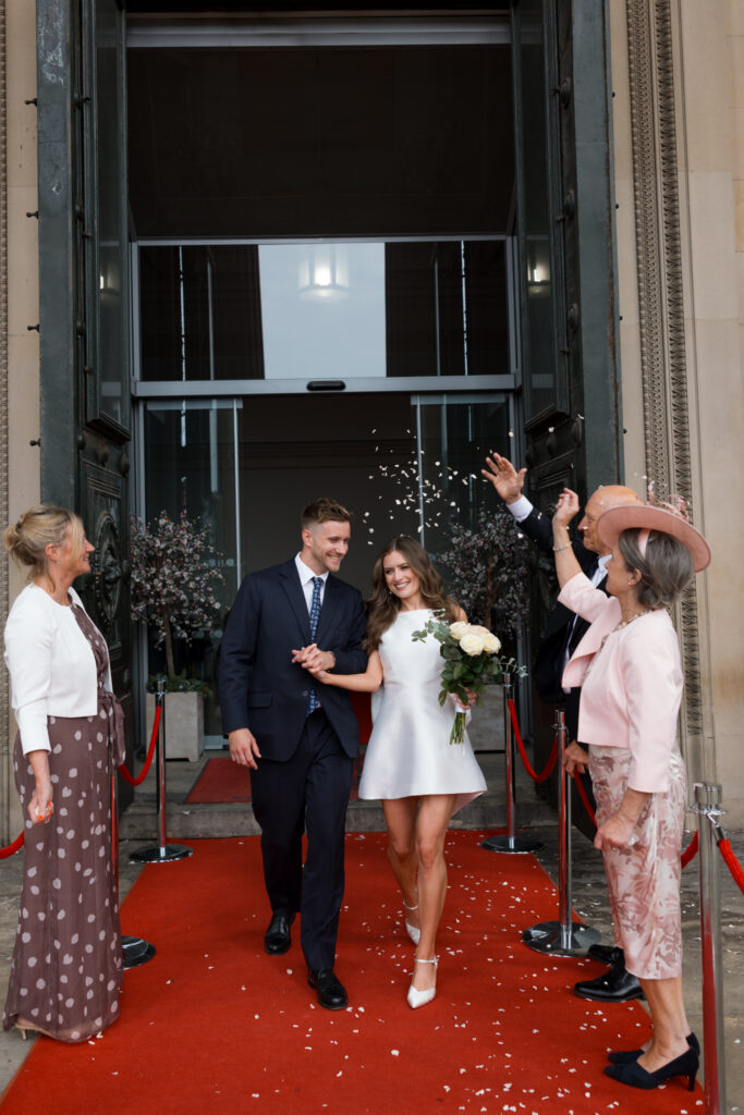 Intimate Liverpool elopement with Gen Z couple – city chic civil wedding at St George's Hall with editorial fashion forward photography by Ivana King