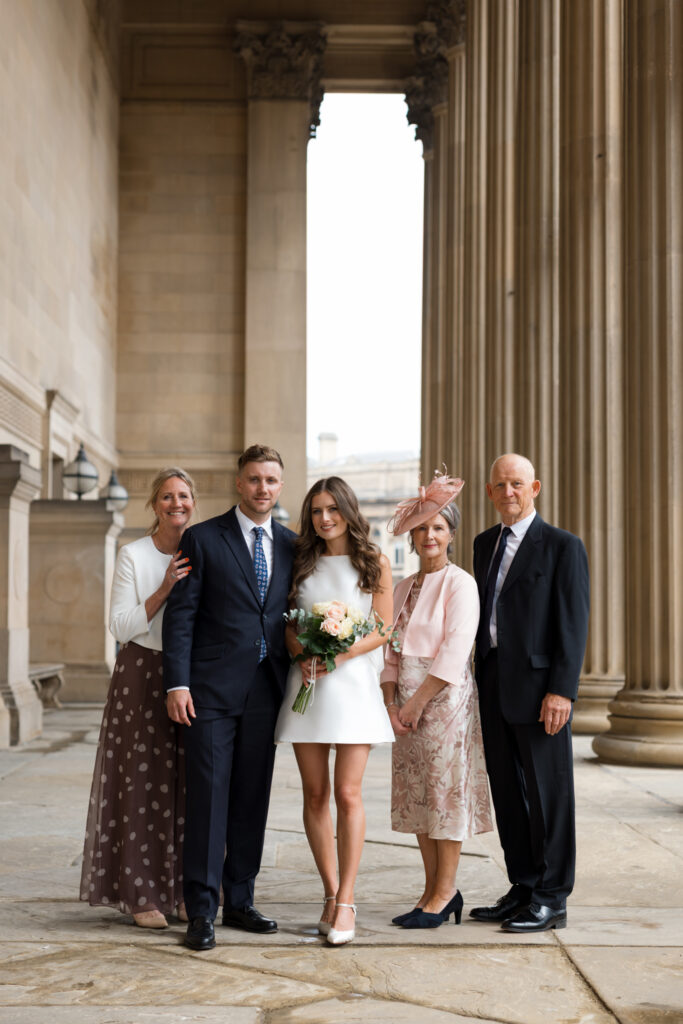 Intimate Liverpool elopement with Gen Z couple – city chic civil wedding at St George's Hall with editorial fashion forward photography by Ivana King