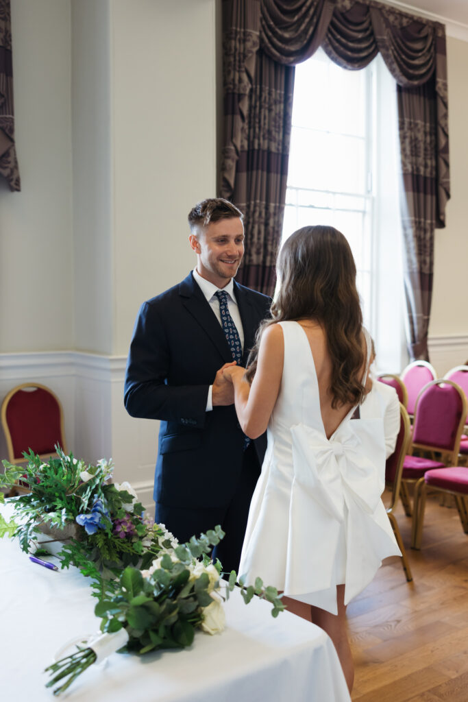 Intimate Liverpool elopement with Gen Z couple – city chic civil wedding at St George's Hall with editorial fashion forward photography by Ivana King