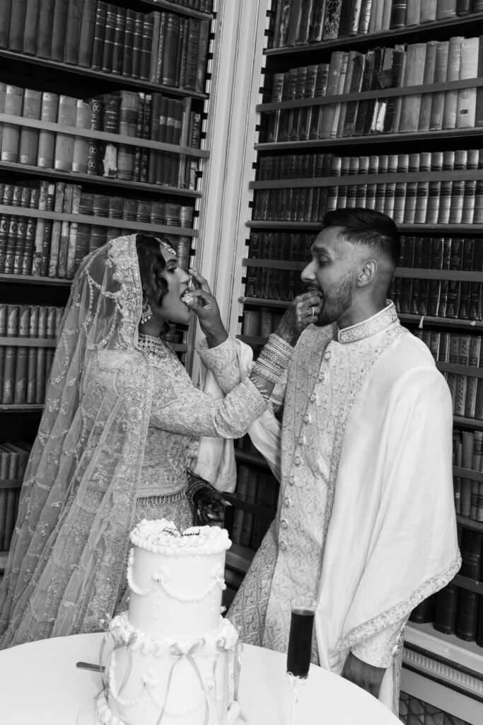 Editorial Wedding Photographer, Luxury Wedding at Avington Estate Park South London UK, Asian Indian Cake Cutting