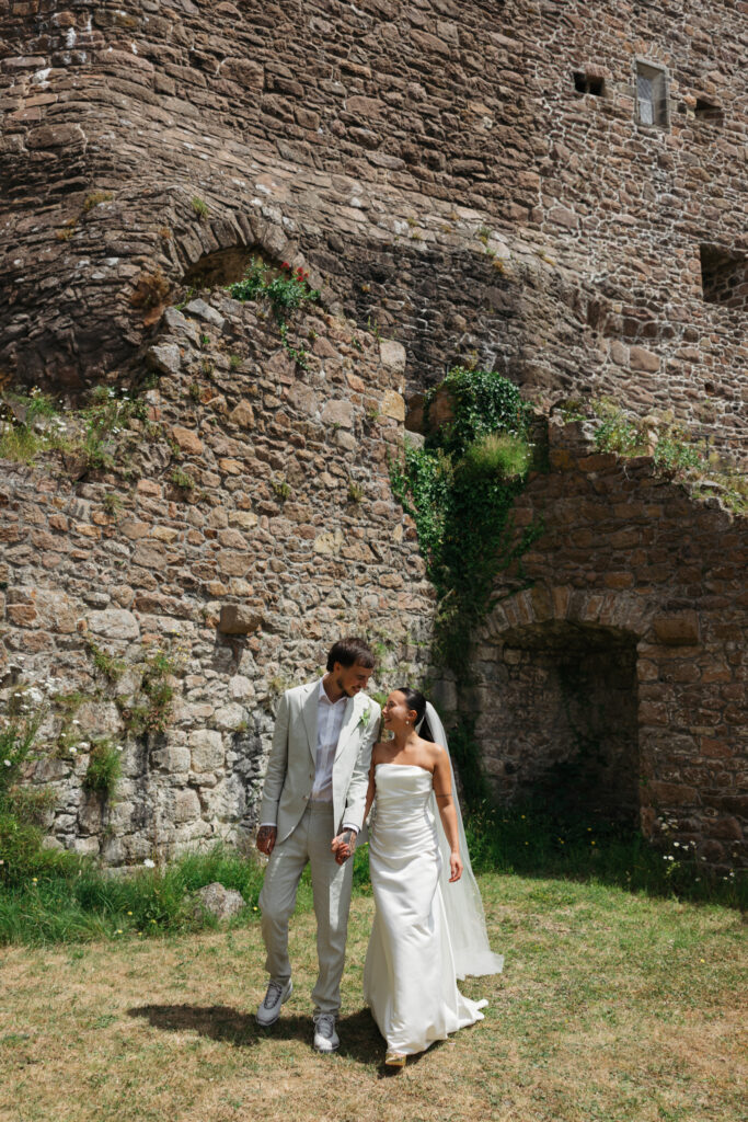 editorial wedding photographer at Gorey castle month Orgueil castle jersey Channel Islands, editorial couple portraits