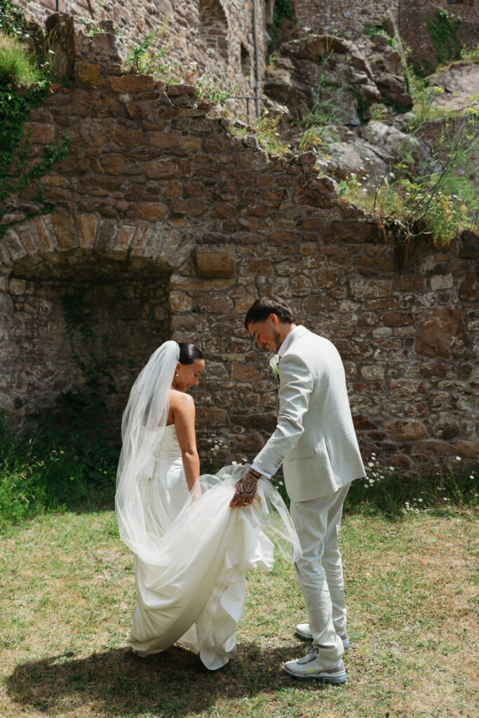 editorial wedding photographer at Gorey castle month Orgueil castle jersey Channel Islands, editorial couple portraits, asian bride from Hong Kong, British groom