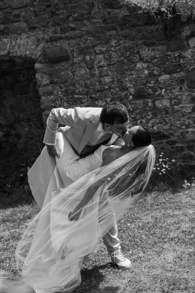 editorial wedding photographer at Gorey castle month Orgueil castle jersey Channel Islands, editorial couple portraits, asian bride from Hong Kong, British groom