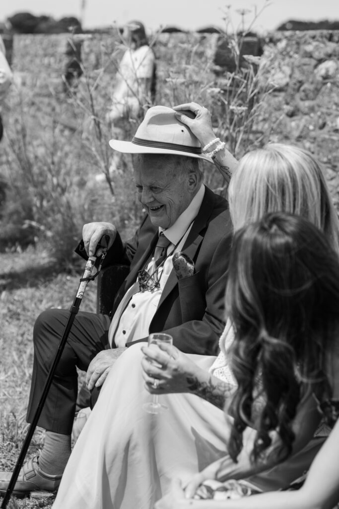 editorial wedding photographer at Gorey castle month Orgueil castle jersey Channel Islands, welcome drinks and cocktail hour