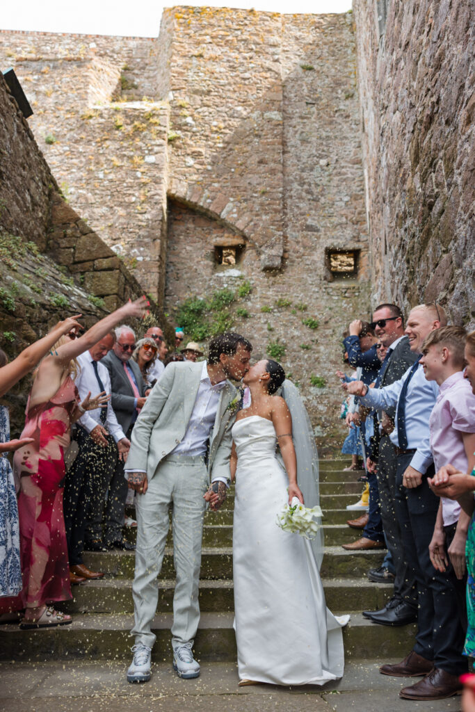 editorial wedding photographer at Gorey castle month Orgueil castle jersey Channel Islands, wedding breakfast detail shots, confetti shots, asian bride