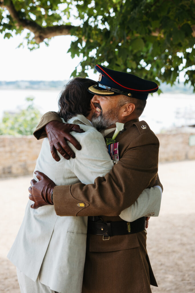editorial wedding photographer at Gorey castle month Orgueil castle jersey Channel Islands, formal family photos, asian bride, military father of the groom