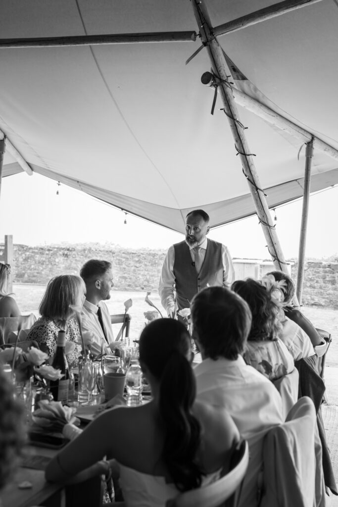 editorial wedding photographer at Gorey castle month Orgueil castle jersey Channel Islands, wedding breakfast detail shots, tipi reception, asian bride from Hong Kong, British groom, speeches