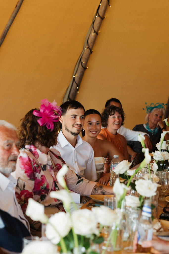 editorial wedding photographer at Gorey castle month Orgueil castle jersey Channel Islands, wedding breakfast detail shots, tipi reception, asian bride from Hong Kong, British groom, speeches