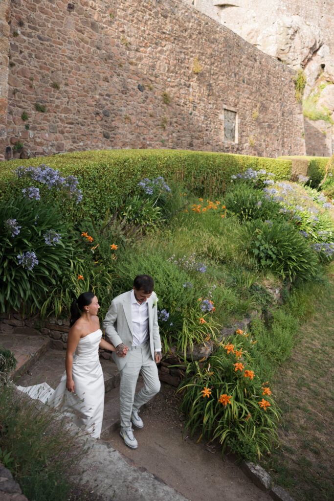 editorial wedding photographer at Gorey castle month Orgueil castle jersey Channel Islands, editorial couple portraits, asian bride from Hong Kong, British groom