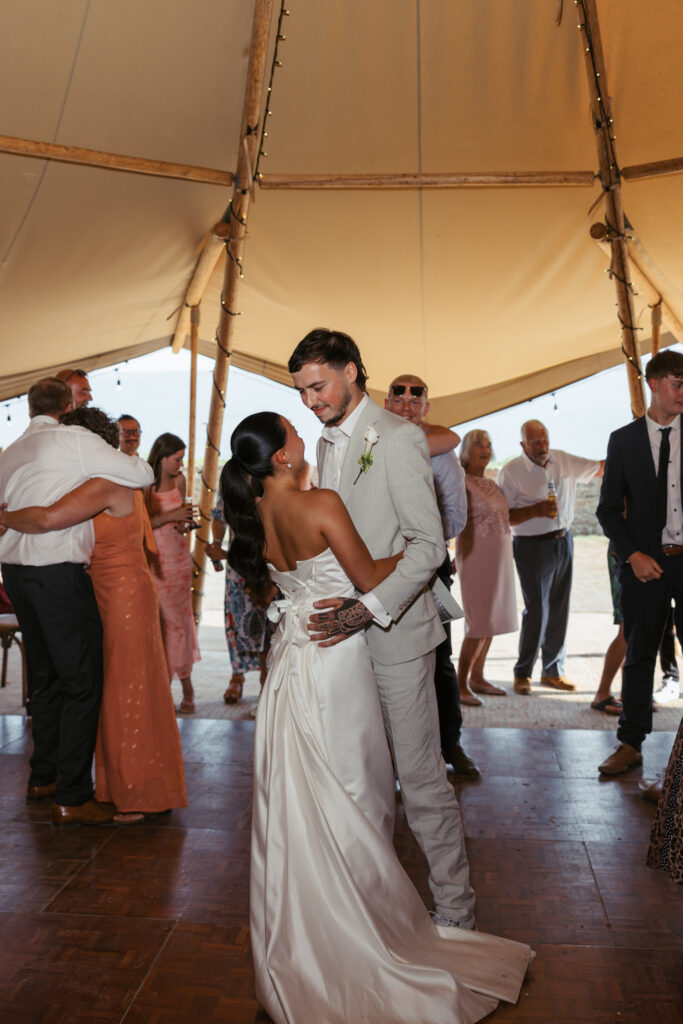 editorial wedding photographer at Gorey castle month Orgueil castle jersey Channel Islands, asian bride from Hong Kong, British groom, party first dance