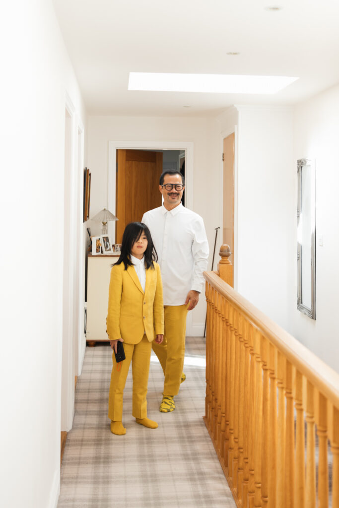 editorial flash bridal prep, asian bride dark hair, editorial wedding photos at Gorey castle month Orgueil castle jersey Channel Islands First look with dad