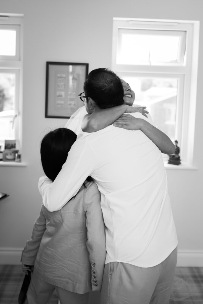 editorial flash bridal prep, asian bride dark hair, editorial wedding photos at Gorey castle month Orgueil castle jersey Channel Islands First look with dad