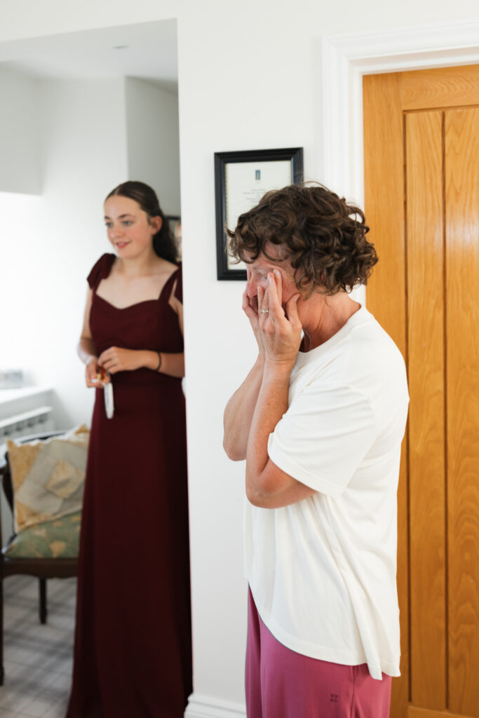 editorial flash bridal prep, asian bride dark hair, editorial wedding photos at Gorey castle month Orgueil castle jersey Channel Islands First look with mum