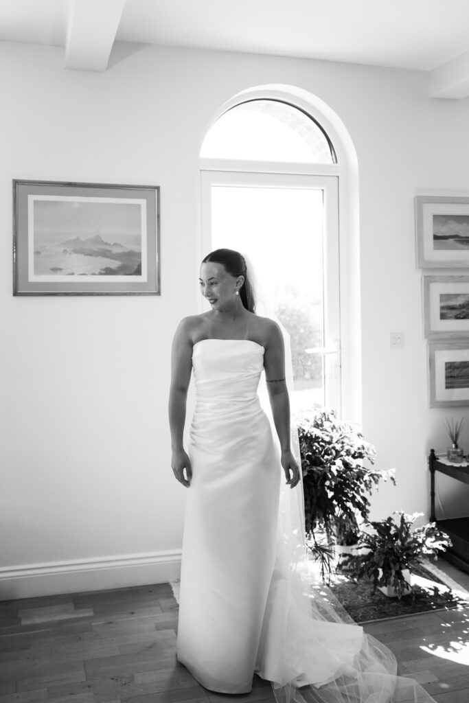 editorial flash bridal prep, asian bride dark hair, editorial wedding photos at Gorey castle month Orgueil castle jersey Channel Islands