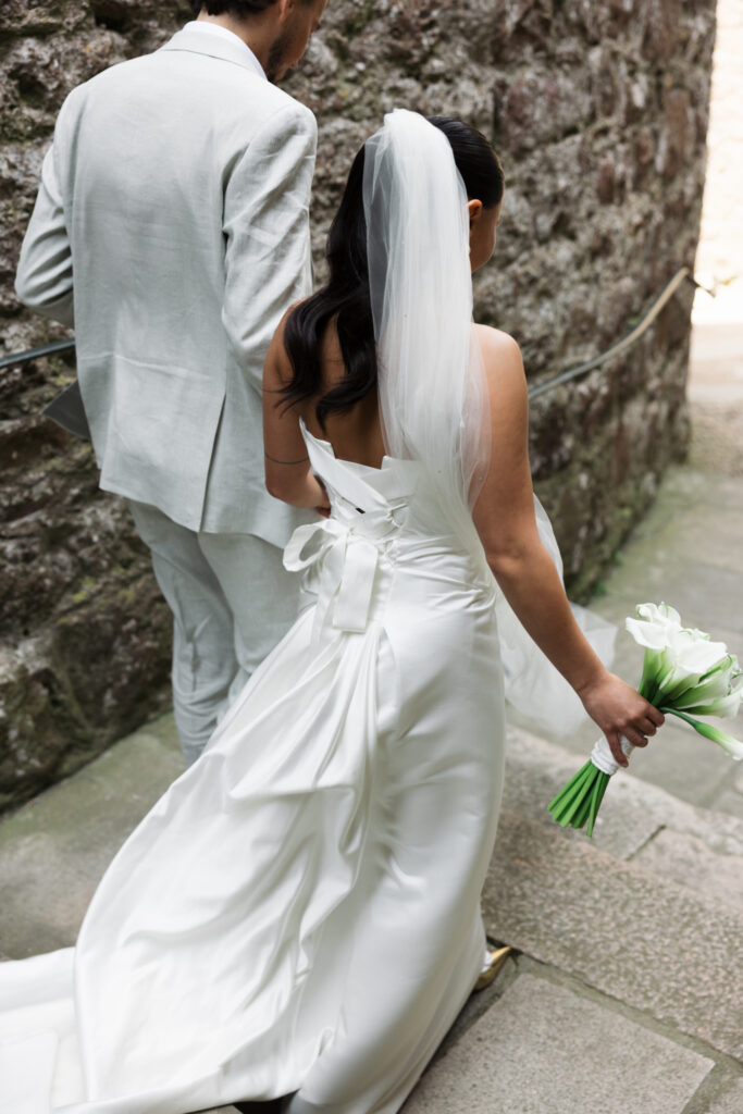 editorial wedding photographer at Gorey castle month Orgueil castle jersey Channel Islands, church ceremony, storytelling, candid, documentary, editorial, couple portraits