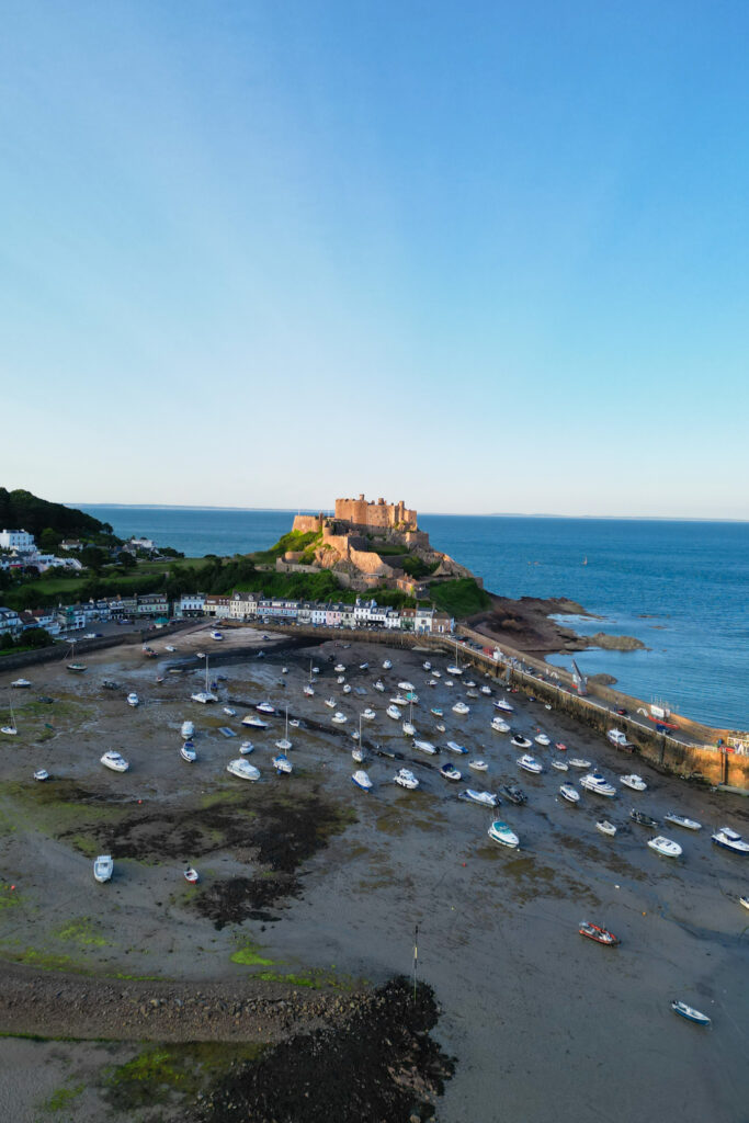 editorial flash bridal prep, asian bride dark hair, editorial wedding photos at Gorey castle month Orgueil castle jersey Channel Islands