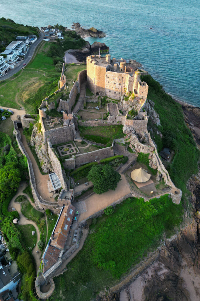 editorial flash bridal prep, asian bride dark hair, editorial wedding photos at Gorey castle month Orgueil castle jersey Channel Islands