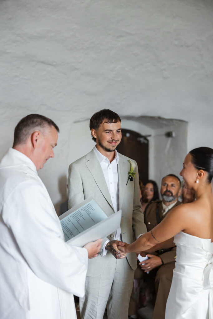 editorial wedding photos at Gorey castle month Orgueil castle jersey Channel Islands, church ceremony