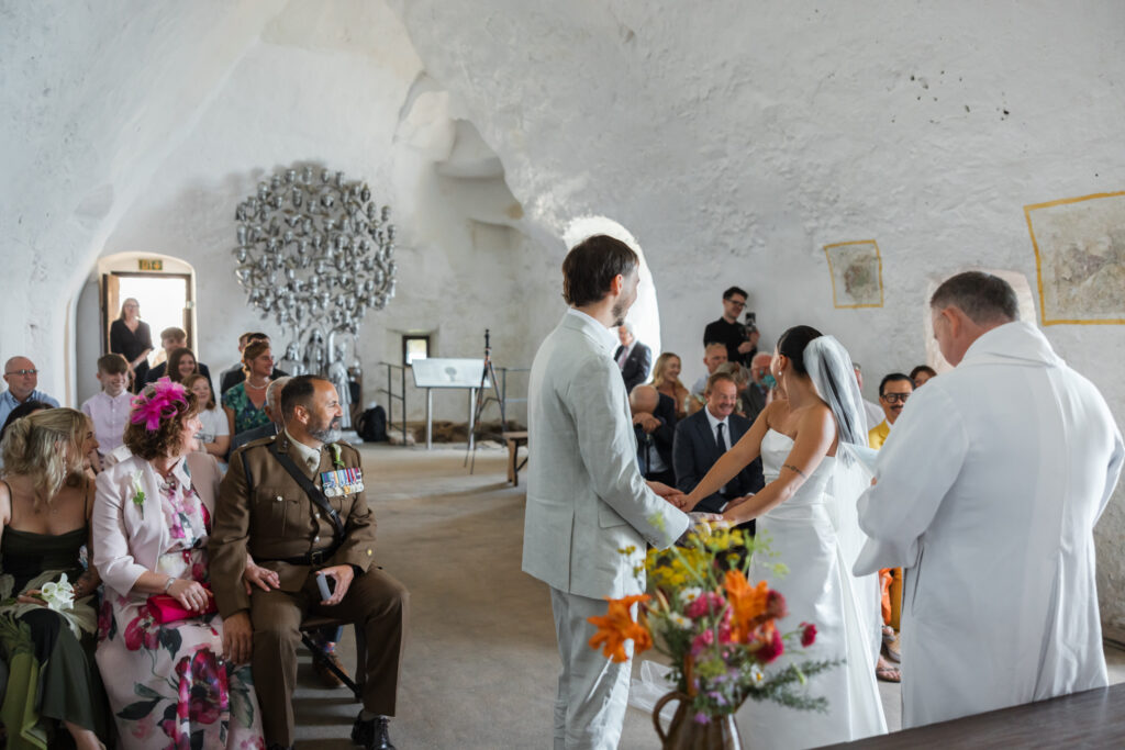 editorial wedding photos at Gorey castle month Orgueil castle jersey Channel Islands, church ceremony