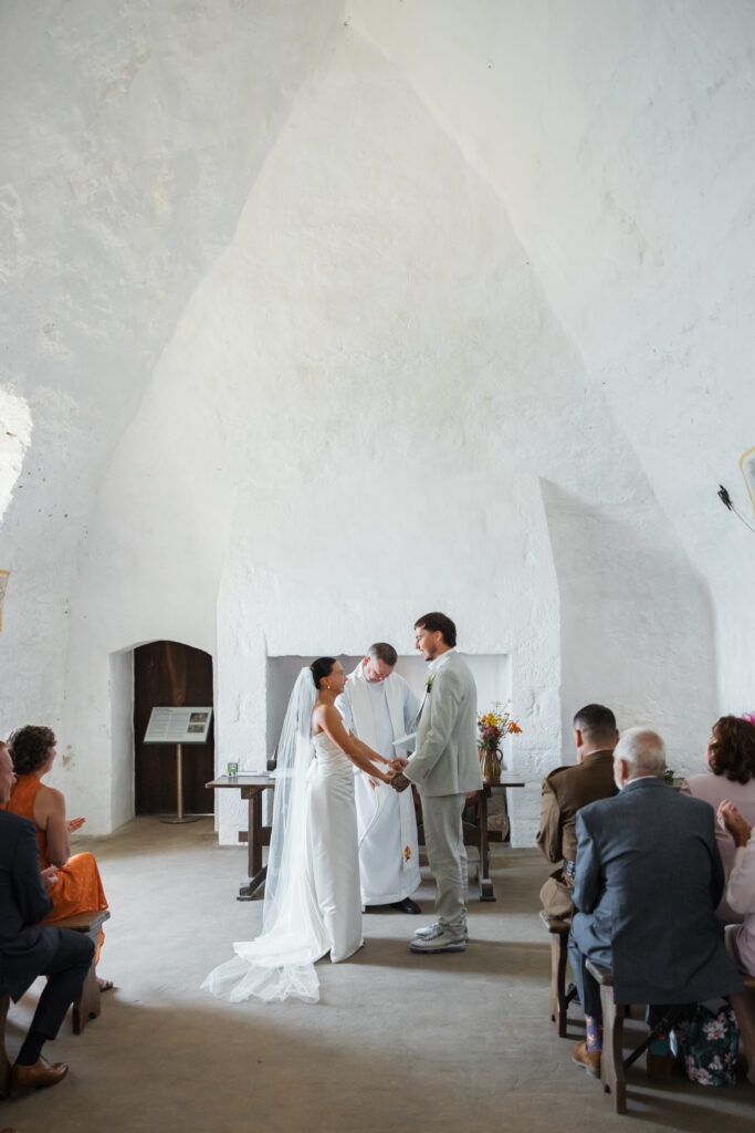 editorial wedding photos at Gorey castle month Orgueil castle jersey Channel Islands, church ceremony, storytelling, candid, documentary, editorial