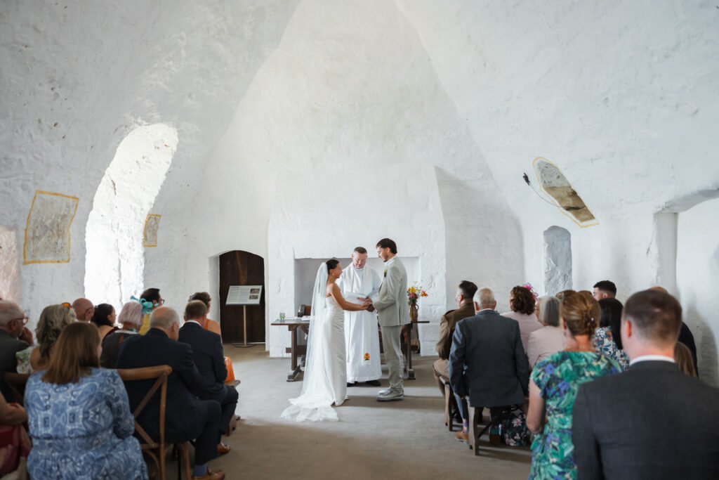 editorial wedding photos at Gorey castle month Orgueil castle jersey Channel Islands, church ceremony, storytelling, candid, documentary, editorial