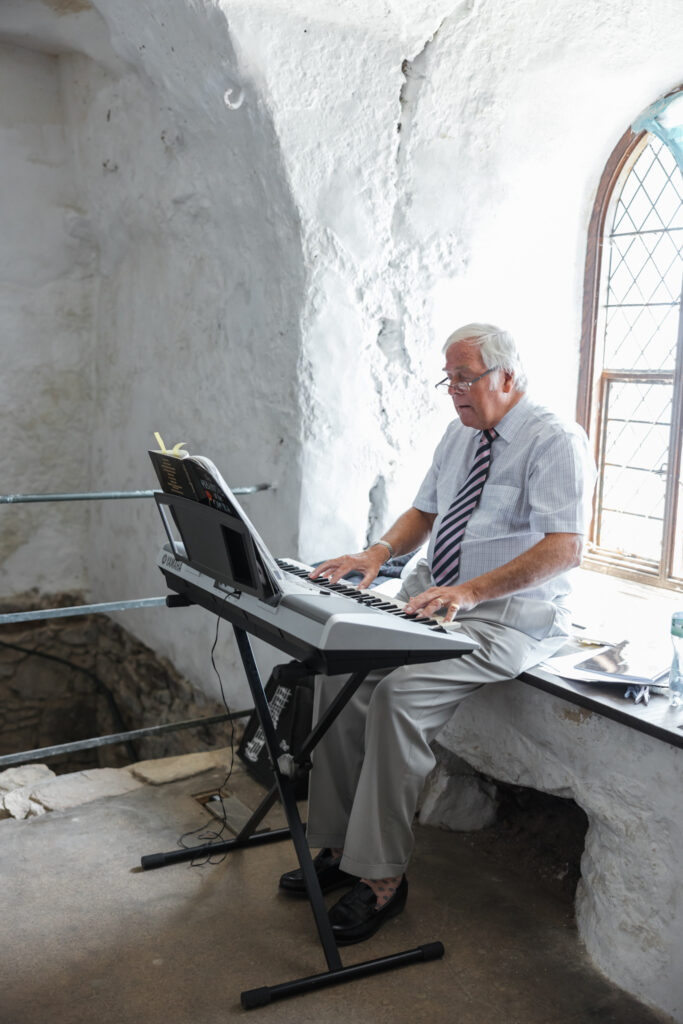 editorial wedding photos at Gorey castle month Orgueil castle jersey Channel Islands, church ceremony, storytelling, candid, documentary, editorial