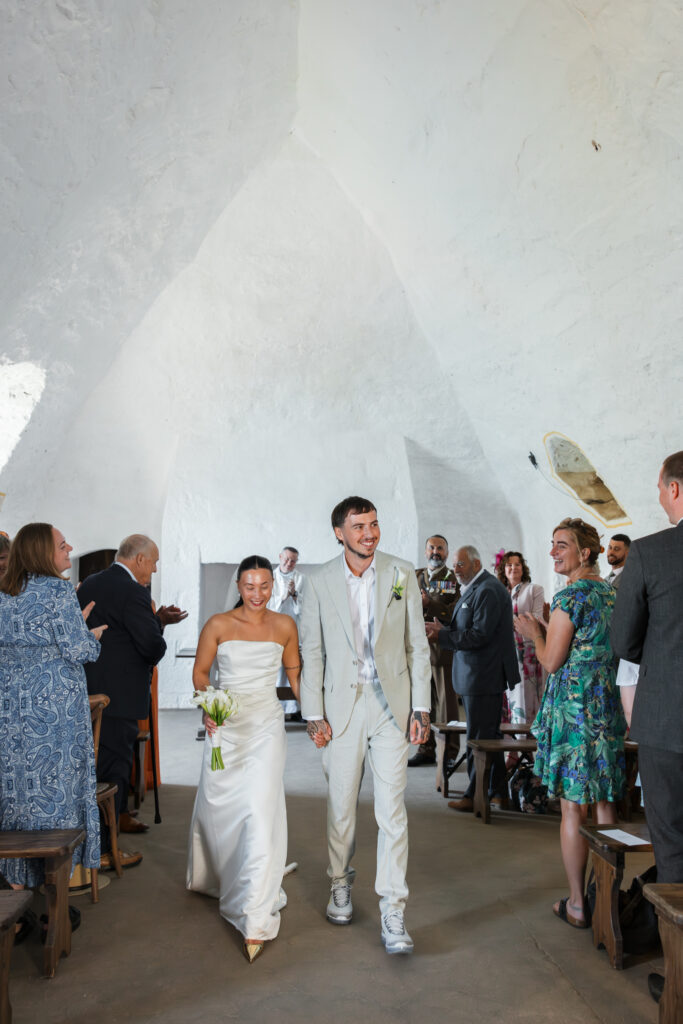 editorial wedding photos at Gorey castle month Orgueil castle jersey Channel Islands, church ceremony, storytelling, candid, documentary, editorial