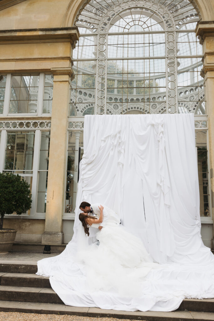Editorial wedding photography of a young Gen Z fashion forward couple during their Russian luxury wedding at Syon Park Conservatory, London.
