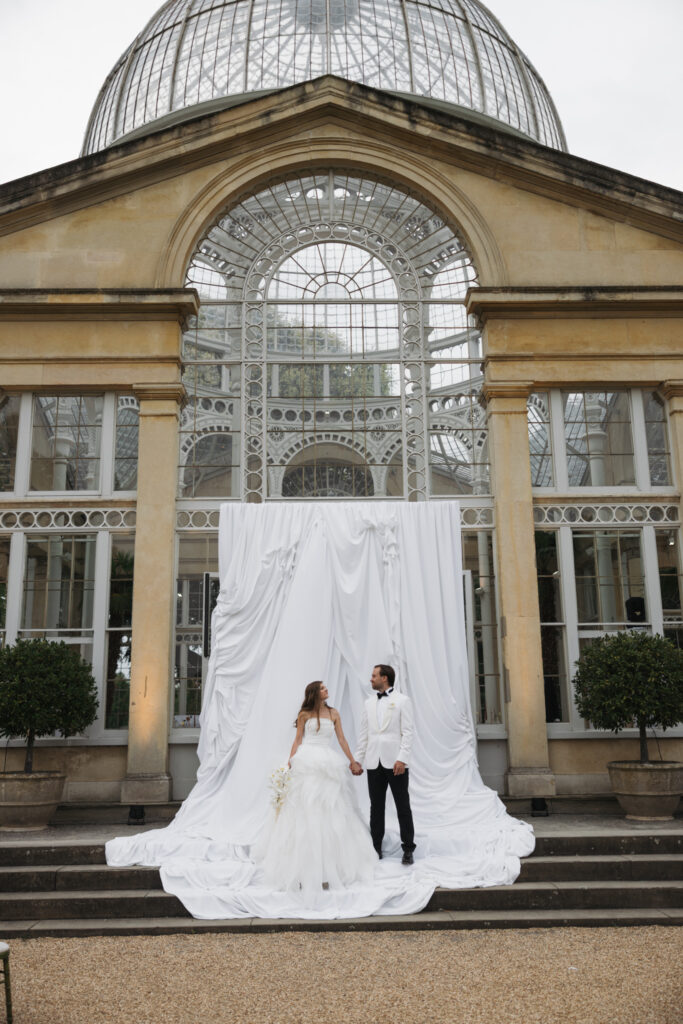 Editorial wedding photography of a young Gen Z fashion forward couple during their Russian luxury wedding at Syon Park Conservatory, London.