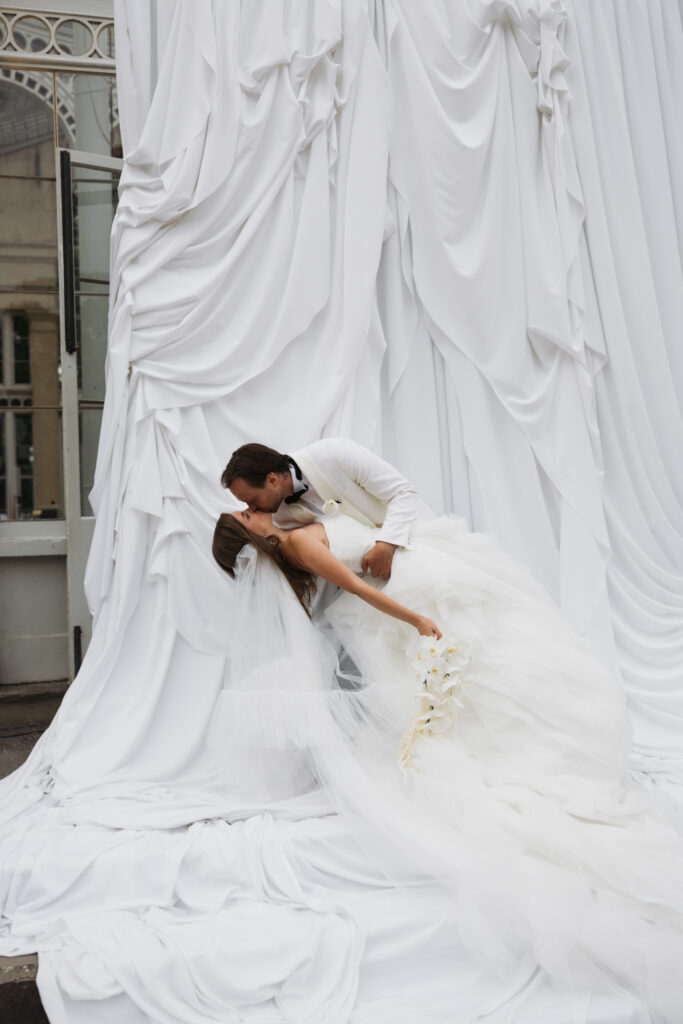 Editorial wedding photography of a young Gen Z fashion forward couple during their Russian luxury wedding at Syon Park Conservatory, London.