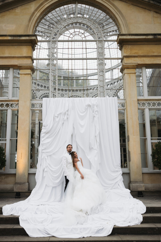 Editorial wedding photography of a young Gen Z fashion forward couple during their Russian luxury wedding at Syon Park Conservatory, London.