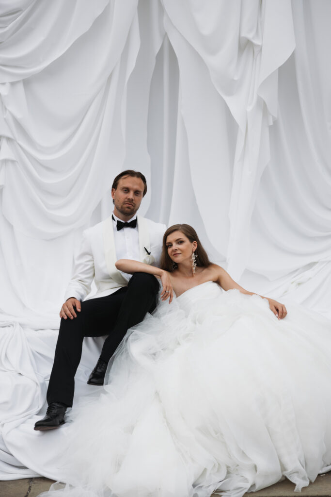 Editorial wedding photography of a young Gen Z fashion forward couple during their Russian luxury wedding at Syon Park Conservatory, London.