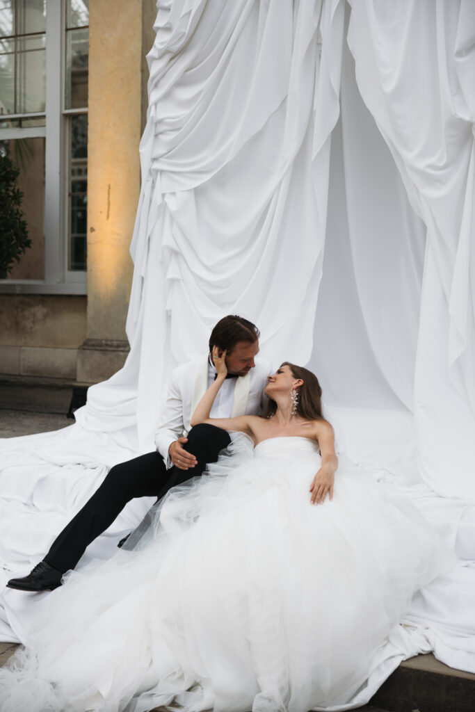 Editorial wedding photography of a young Gen Z fashion forward couple during their Russian luxury wedding at Syon Park Conservatory, London.