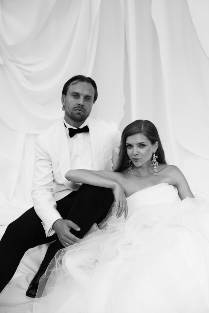 Editorial wedding photography of a young Gen Z fashion forward couple during their Russian luxury wedding at Syon Park Conservatory, London.