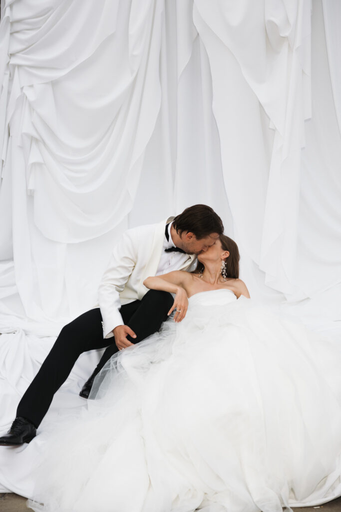 Editorial wedding photography of a young Gen Z fashion forward couple during their Russian luxury wedding at Syon Park Conservatory, London.