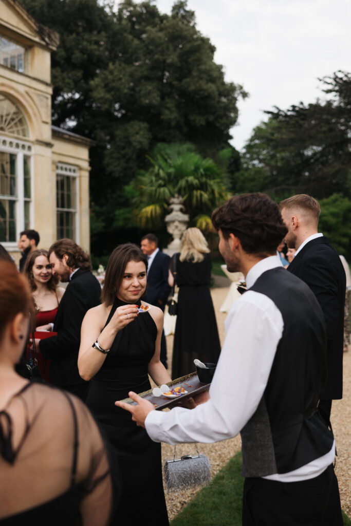 Editorial wedding photography of a young Gen Z fashion forward couple during their Russian luxury wedding at Syon Park Conservatory, London.