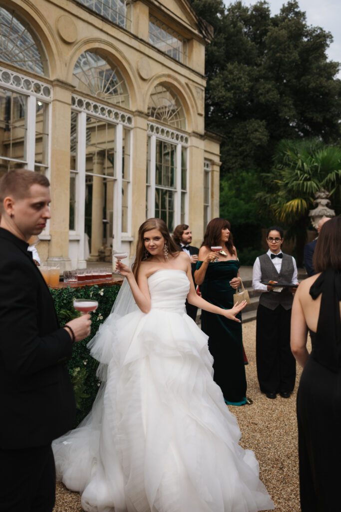 Editorial wedding photography of a young Gen Z fashion forward couple during their Russian luxury wedding at Syon Park Conservatory, London.