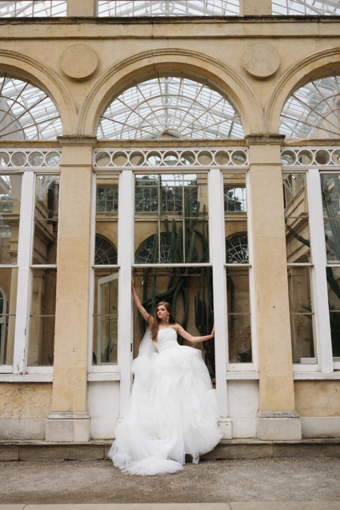Editorial wedding photography of a young Gen Z fashion forward couple during their Russian luxury wedding at Syon Park Conservatory, London.