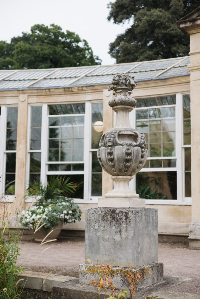 Editorial wedding photography of a young Gen Z fashion forward couple during their Russian luxury wedding at Syon Conservatory, London.
