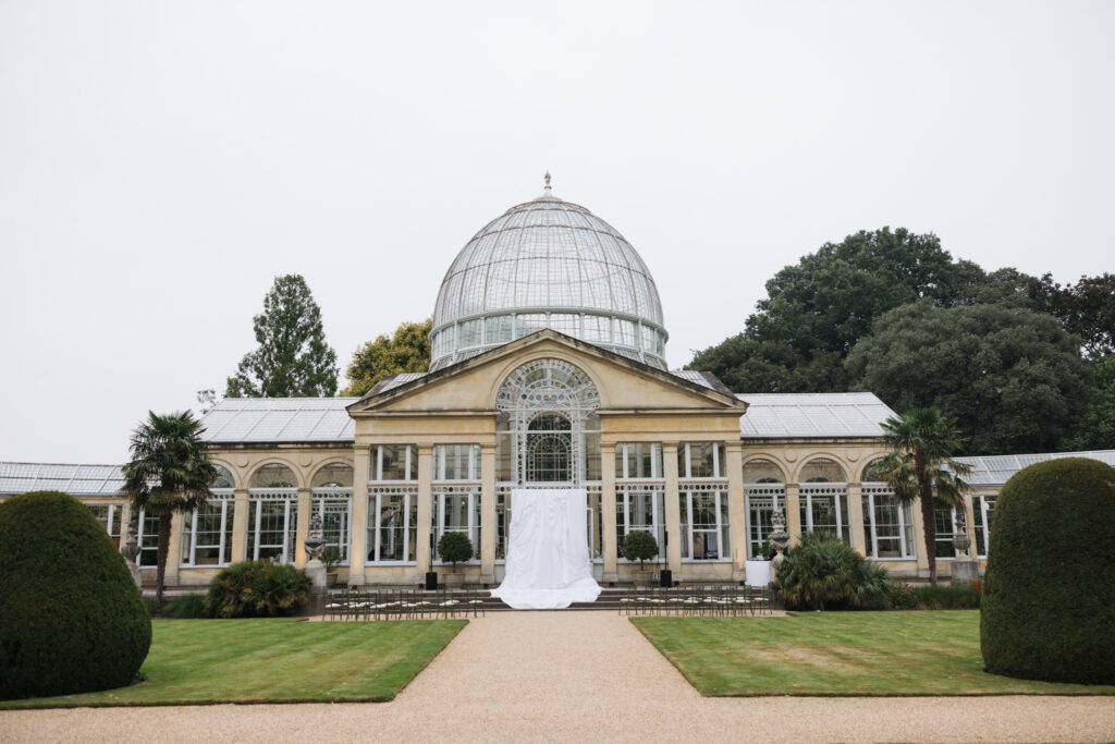 Editorial wedding photography of a young Gen Z fashion forward couple during their Russian luxury wedding at Syon Conservatory, London.