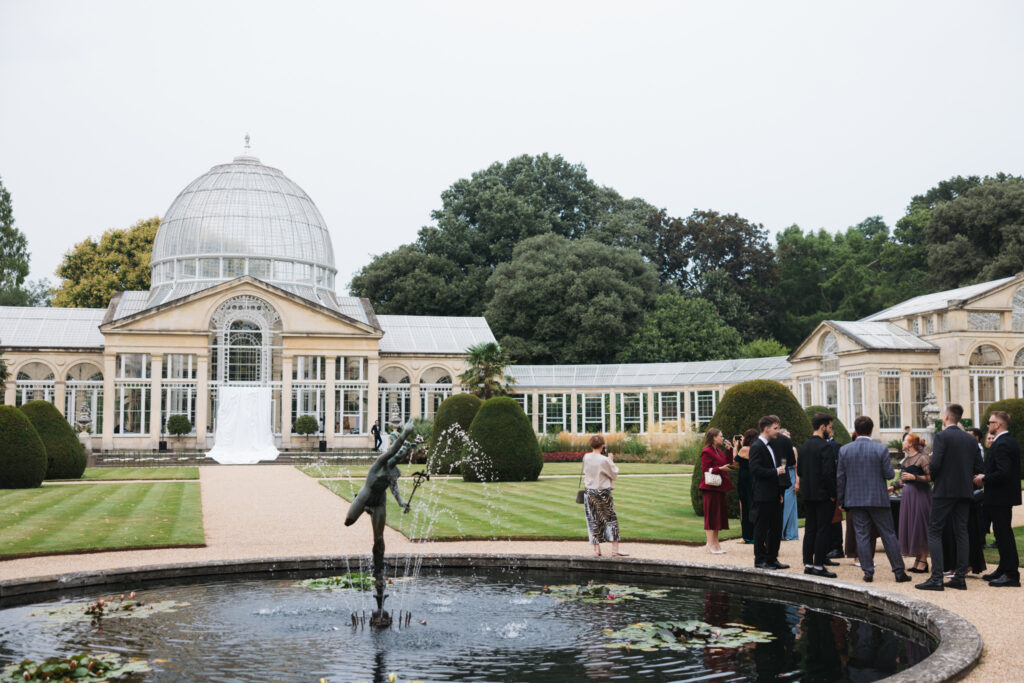 Editorial wedding photography of a young Gen Z fashion forward couple during their Russian luxury wedding at Syon Conservatory, London.