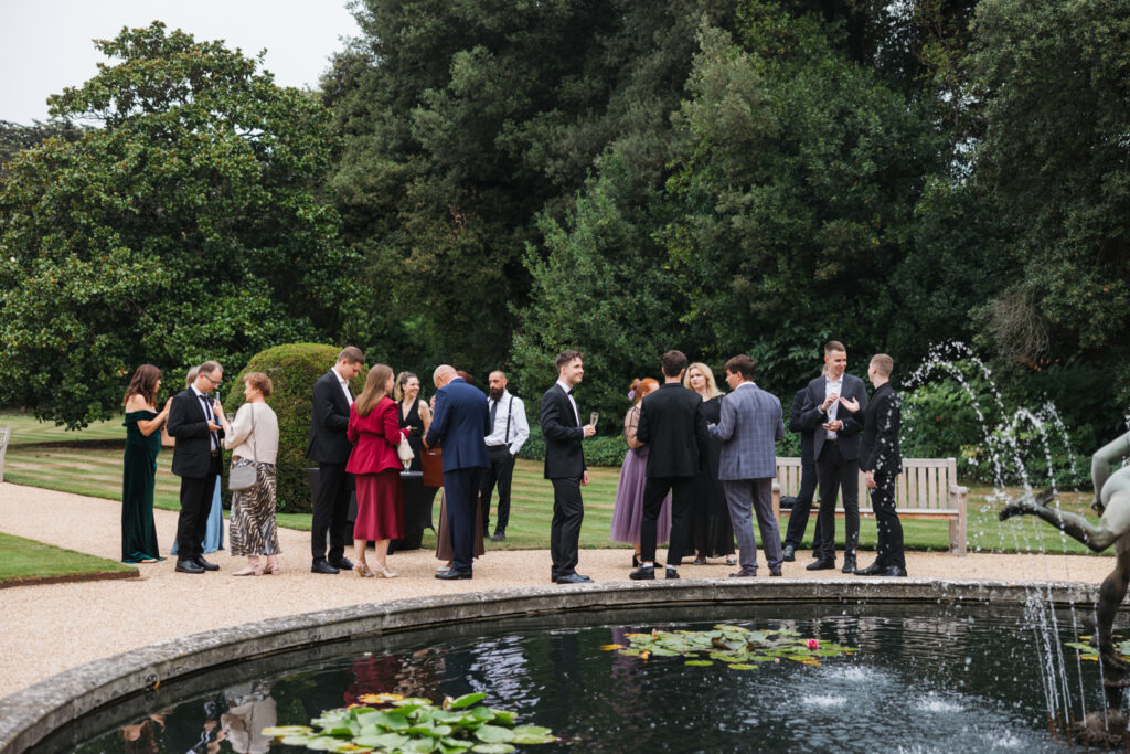 Editorial wedding photography of a young Gen Z fashion forward couple during their Russian luxury wedding at Syon Conservatory, London.