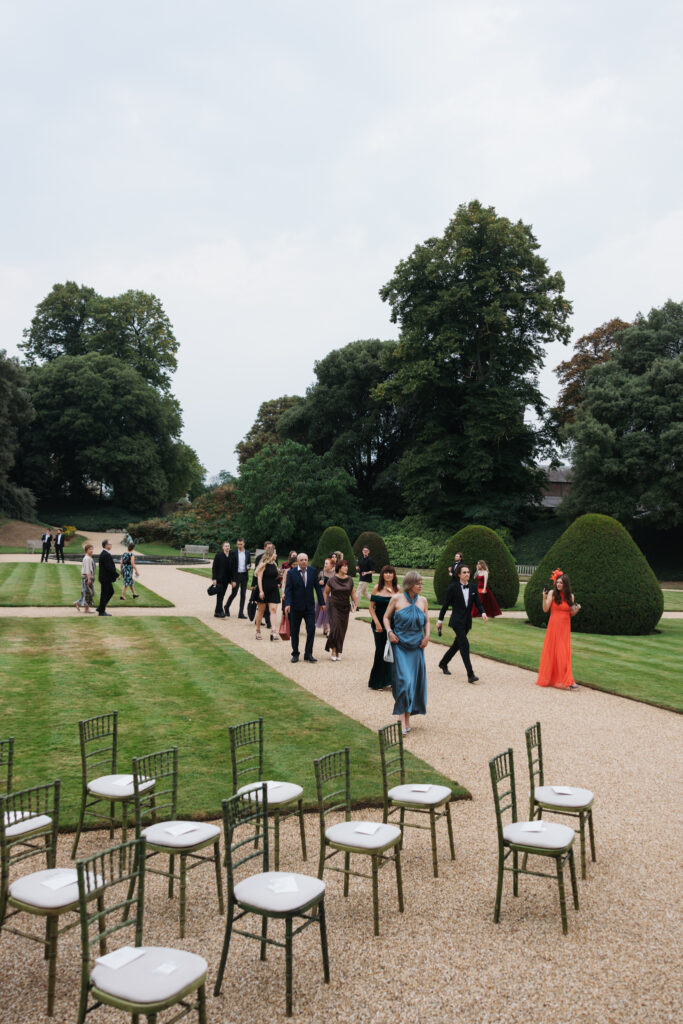 Editorial wedding photography of a young Gen Z fashion forward couple during their Russian luxury wedding at Syon Conservatory, London.