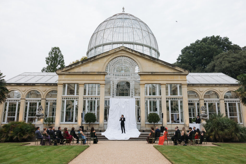 Editorial wedding photography of a young Gen Z fashion forward couple during their Russian luxury wedding at Syon Conservatory, London.