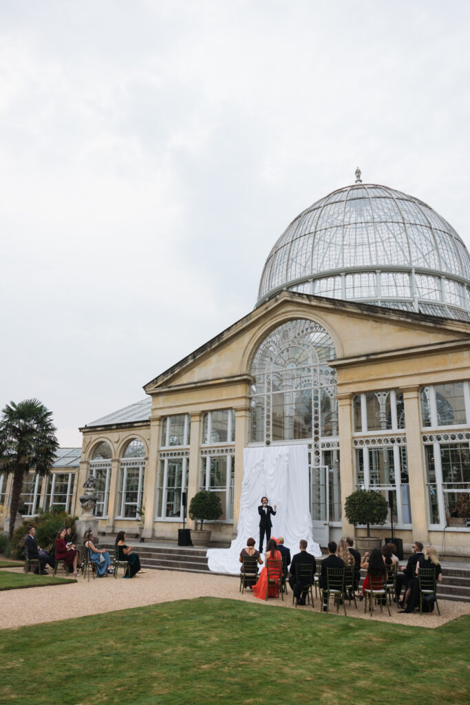 Editorial wedding photography of a young Gen Z fashion forward couple during their Russian luxury wedding at Syon Conservatory, London.