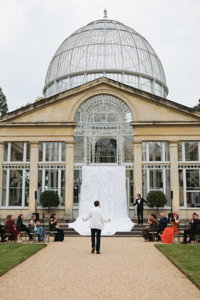 Editorial wedding photography of a young Gen Z fashion forward couple during their Russian luxury wedding at Syon Conservatory, London.